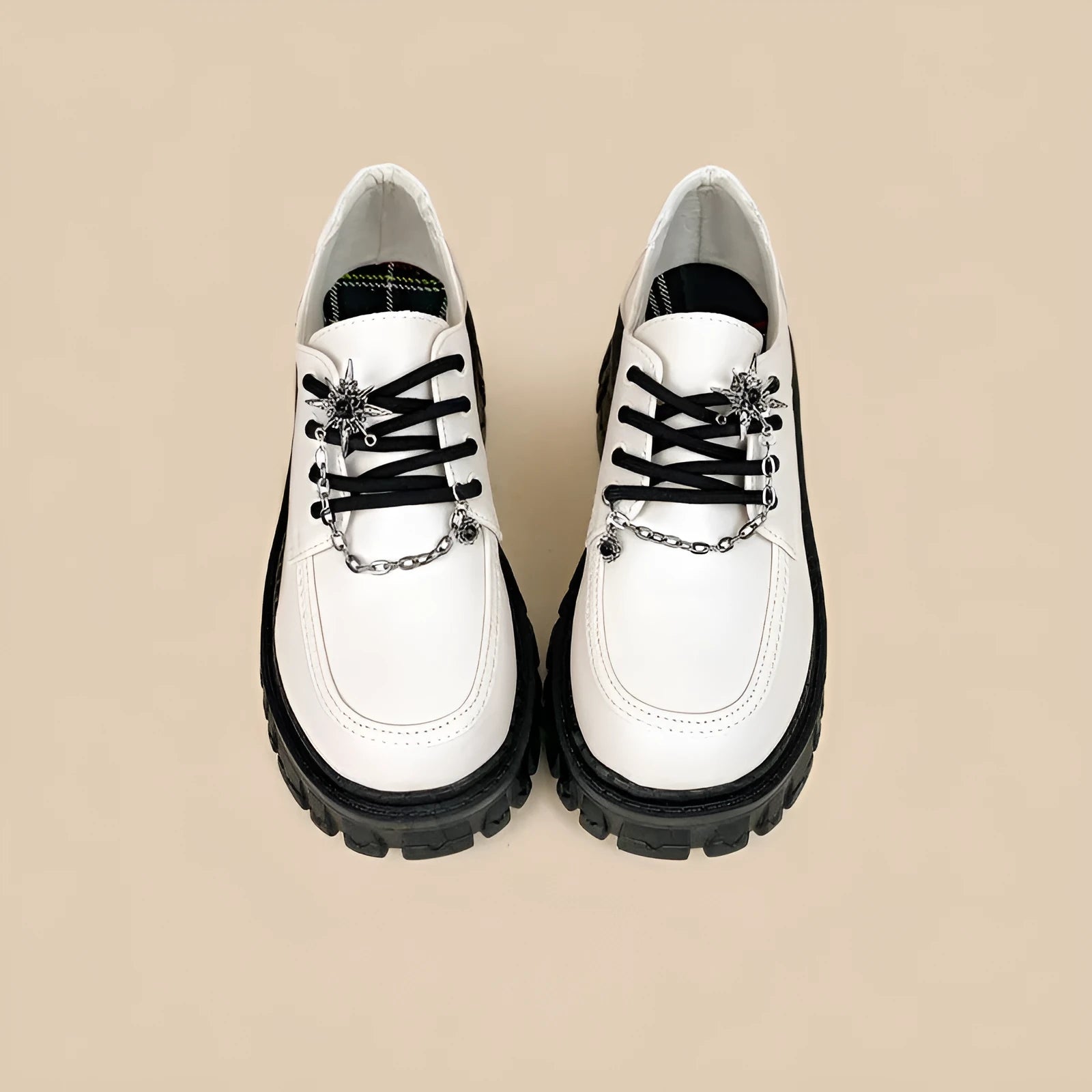 Women's preppy style loafers in Duke Asterism colour with a cross strap and metal buckle.