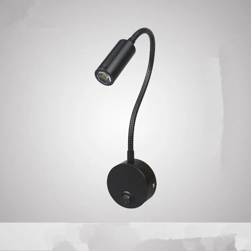 Black 1W LED ceiling painting spotlight with aluminium finish on white ceiling showing 360-degree rotation