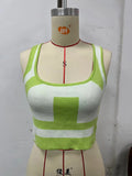 Women's U-collar camisole vest in slim-fit polyester fabric shown in multiple colours