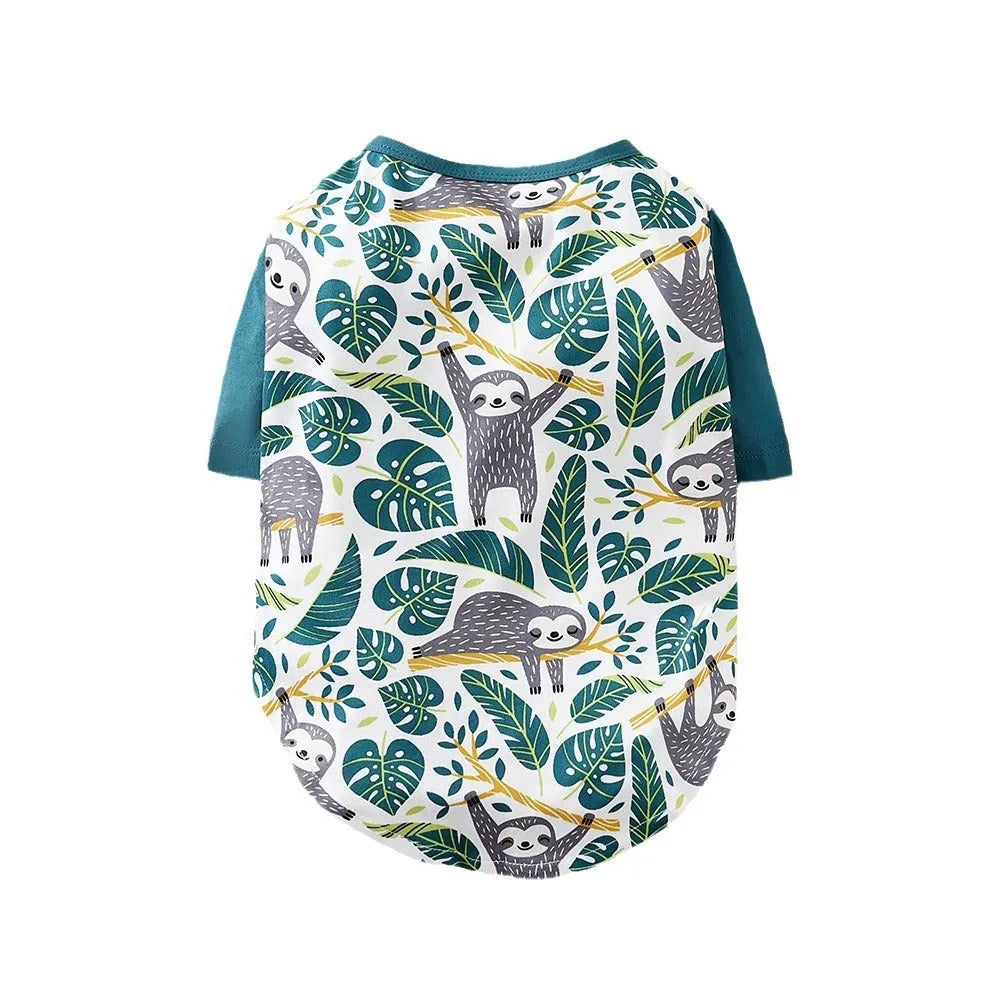 Small dog wearing a colourful printed polyester t-shirt, showing the casual fit and full-body design.