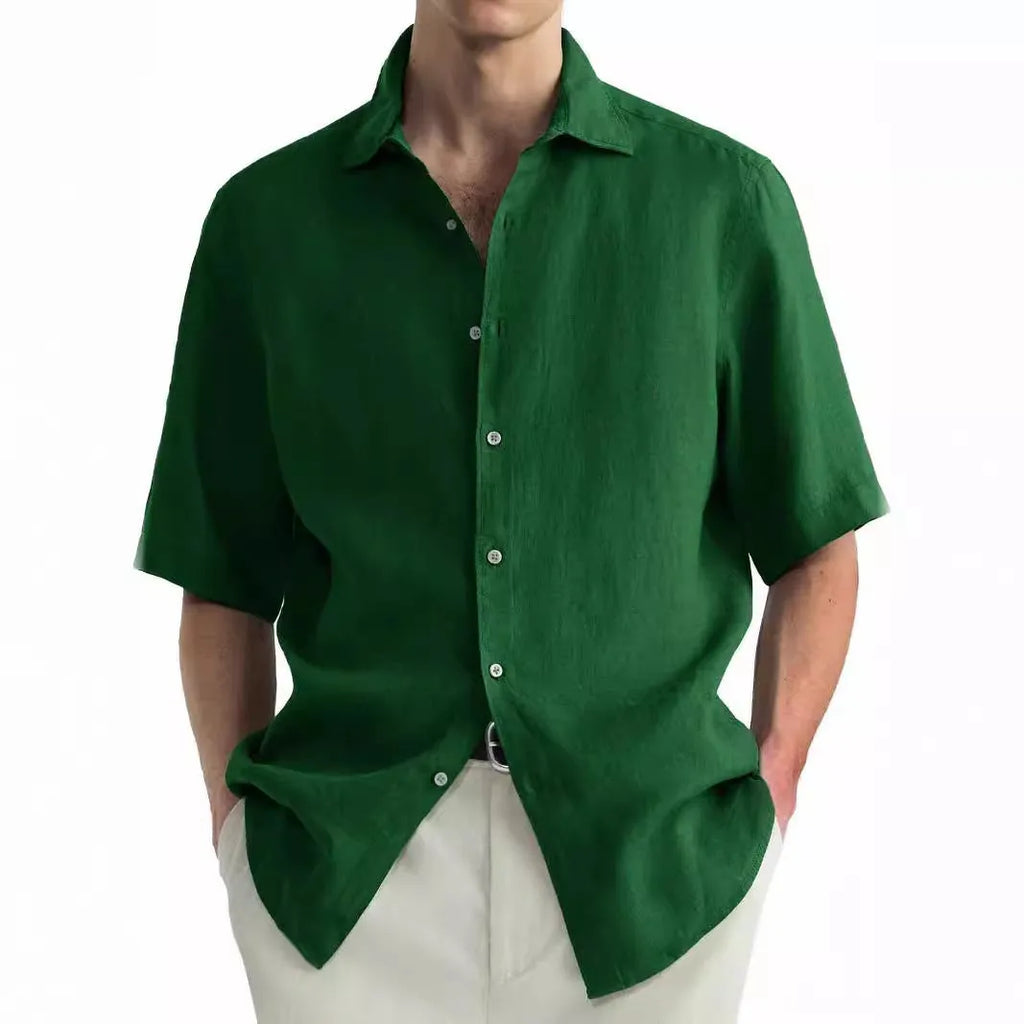 Green men's casual cotton shirt with a cardigan collar laid flat.