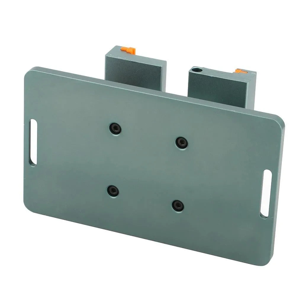 Mobile phone repair fixture with silicone grip and adjustable mechanism next to a demolition crowbar.