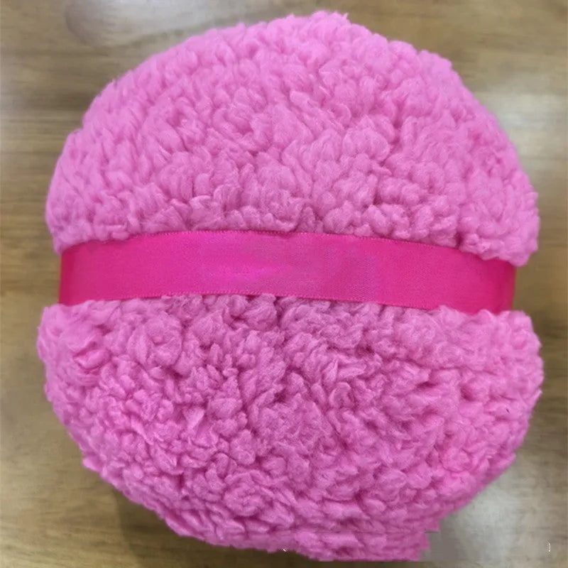 Oversized rectangular plush powder puff in white, skin colour, or pink for makeup application