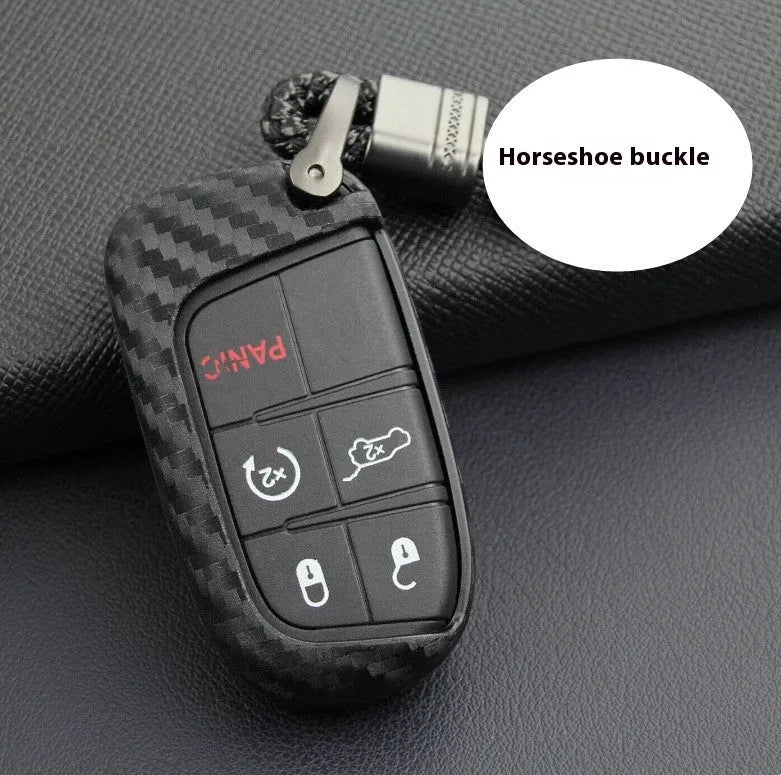 Black silicone car key case with carbon fibre pattern for Dodge, Chrysler, Fiat remote, shown with buckle option.