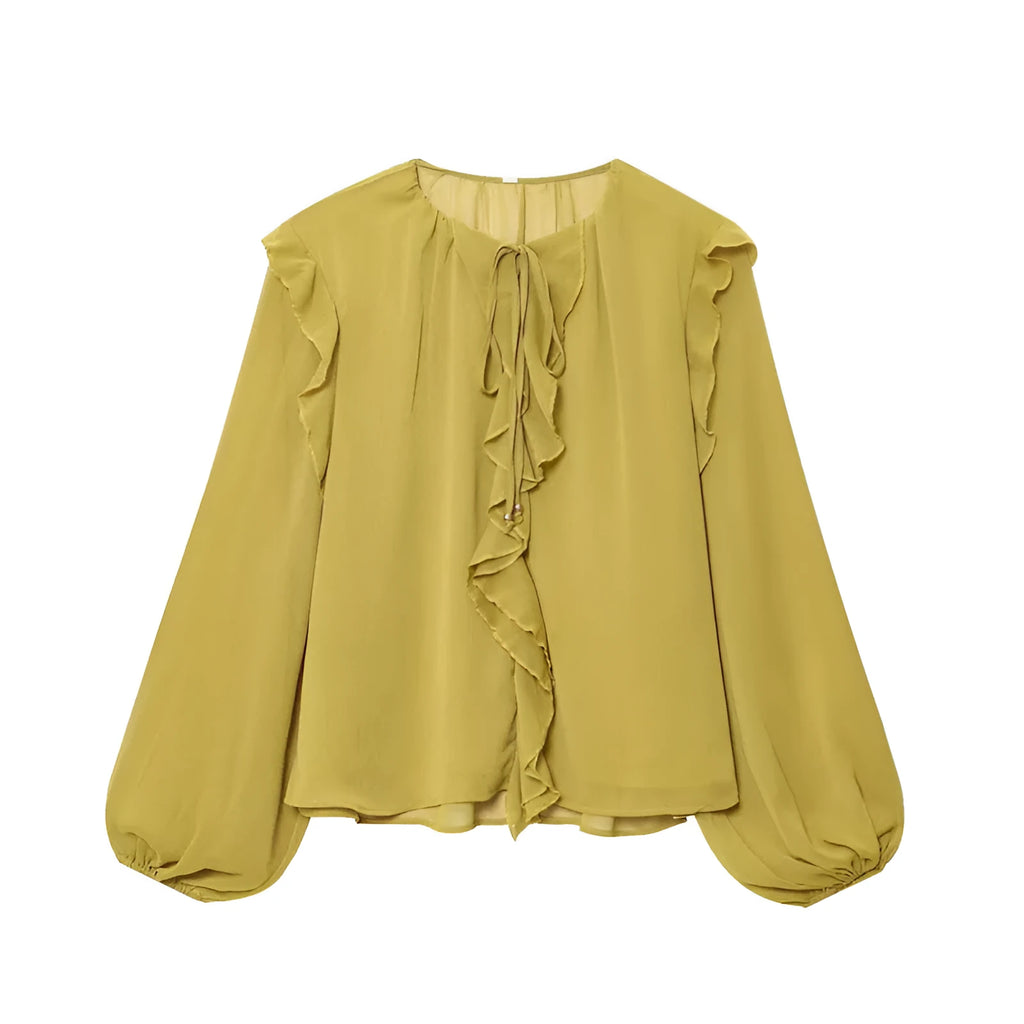 Women's ruffled laminated decorative shirt in yellow with plant and flower print, long sleeves, and button detail