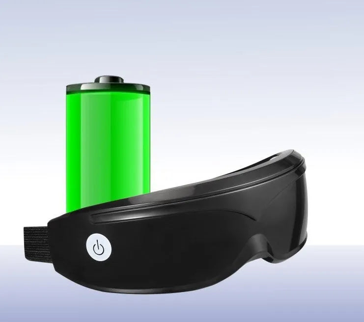 Eye massager with adjustable headband, silicone contacts, and 9 vibration modes in black and white colour