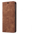 Magnetic leather flip phone case for iPhone shown closed, displaying the solid colour and front cover.