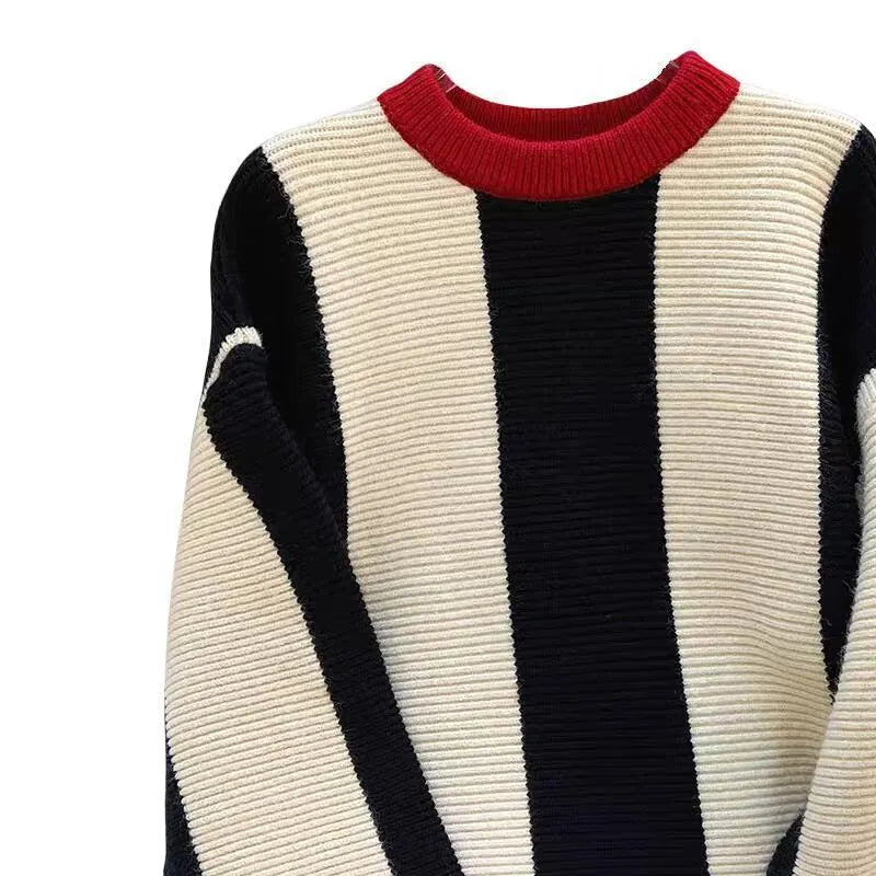Women's cashmere striped knitted pullover sweater with round neck and contrast colours.