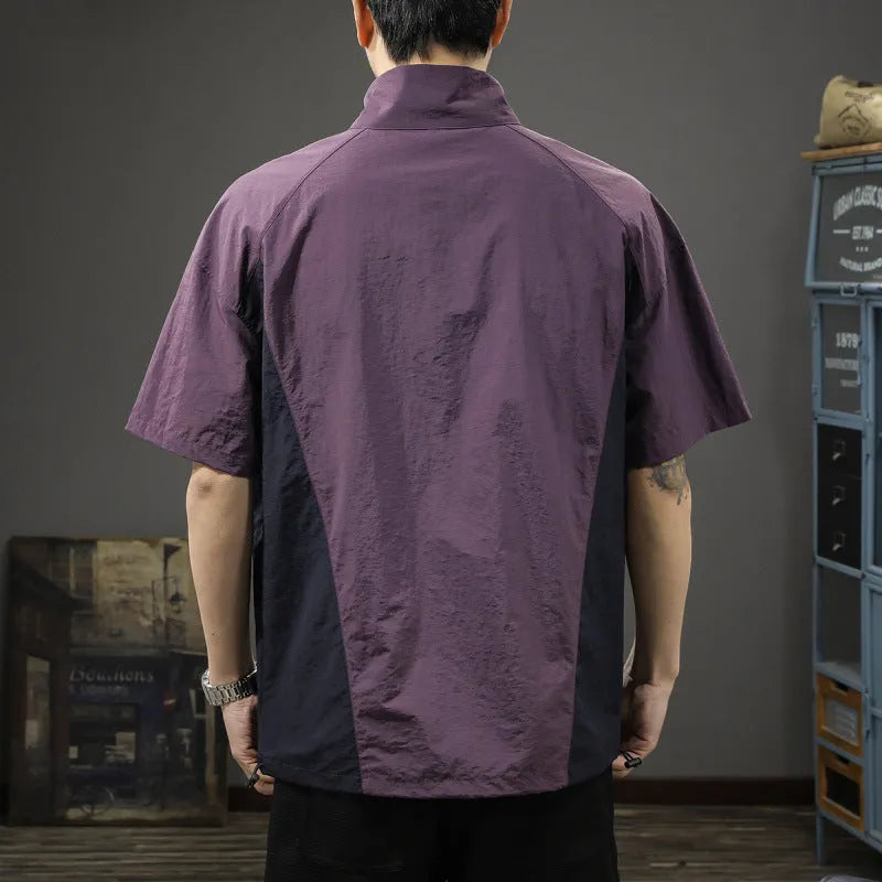 Men's brown half zip stand collar shirt made from ice silk fabric with short sleeves.