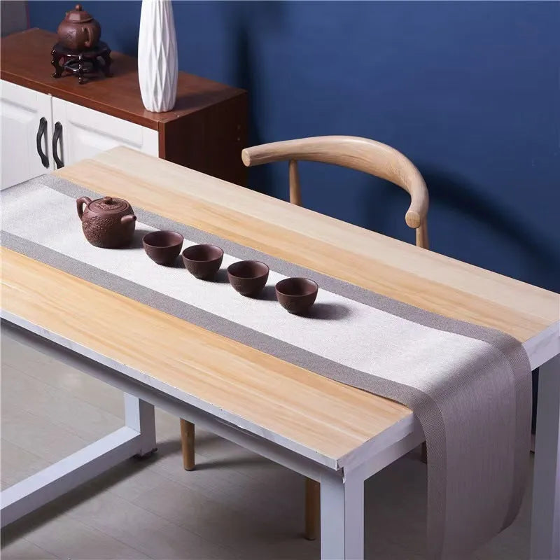 PVC non-slip kitchen sink placemat in gradient bamboo or infinite long colours on a counter.