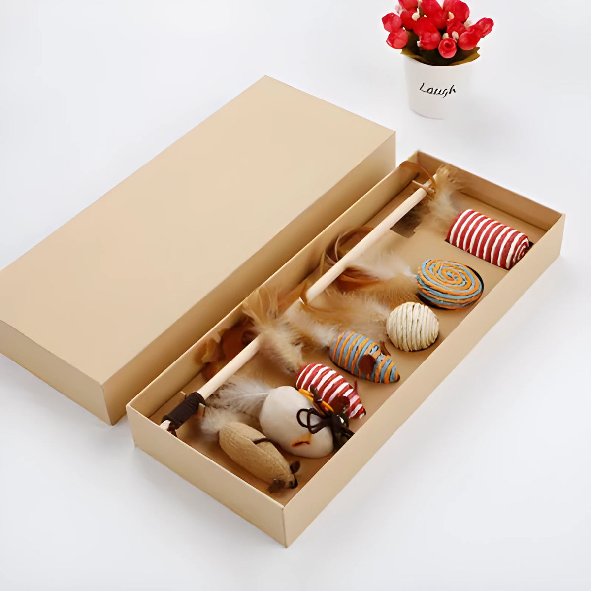 Interactive bell and feather teasing cat toy set with multicoloured feathers and stick in box packaging