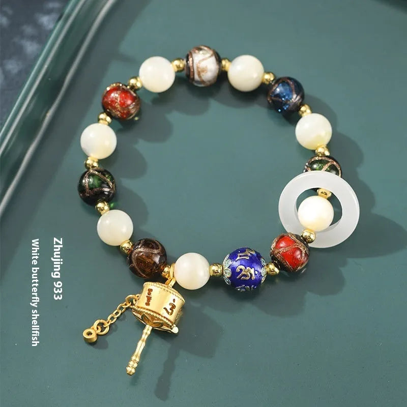 Hand-woven coloured glaze bracelet with Sunstone and white lip shell beads
