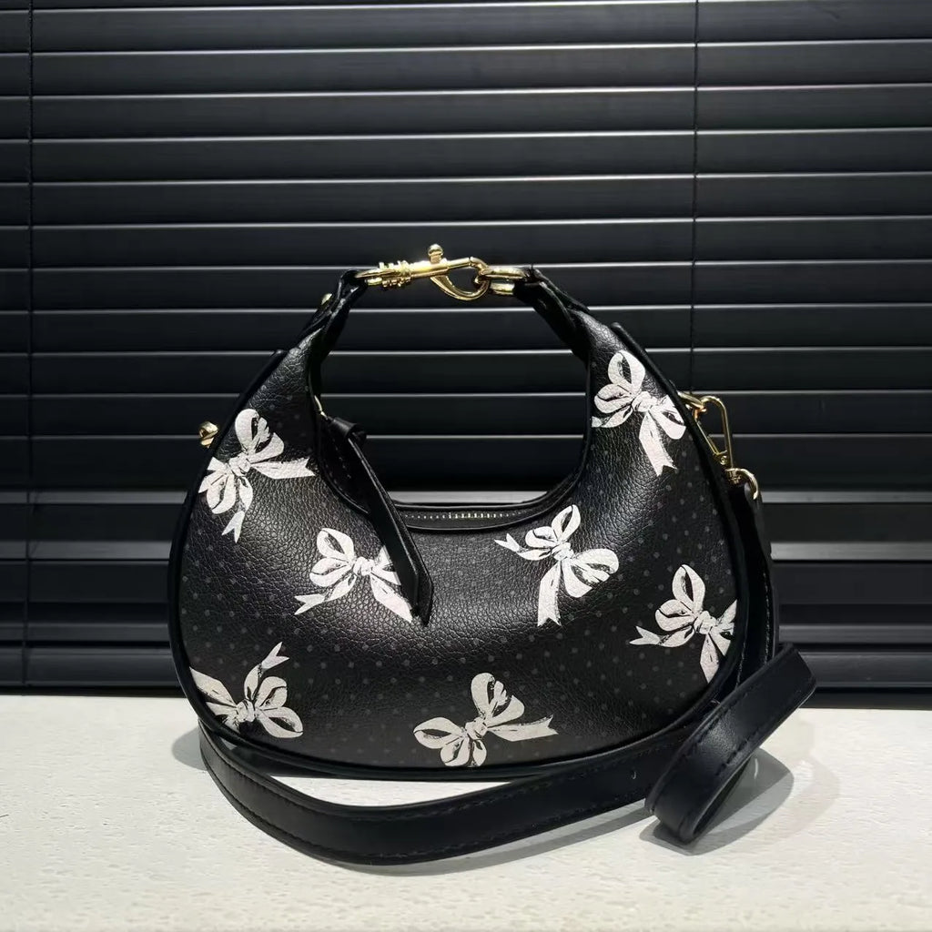 Stitching soft PU leather hobo crossbody bag for women in black with love and chain details, urban simplicity style