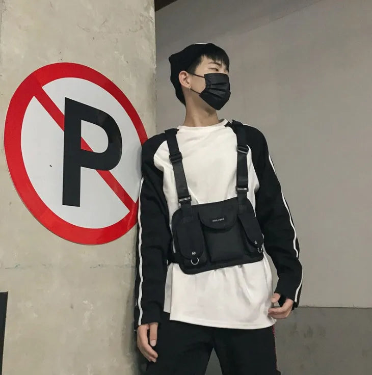 Nylon casual sports backpack in black with curved shoulder straps and plain finish, 20-35L capacity