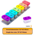 White and rainbow coloured portable pill box with 14 detachable compartments for medicine storage.