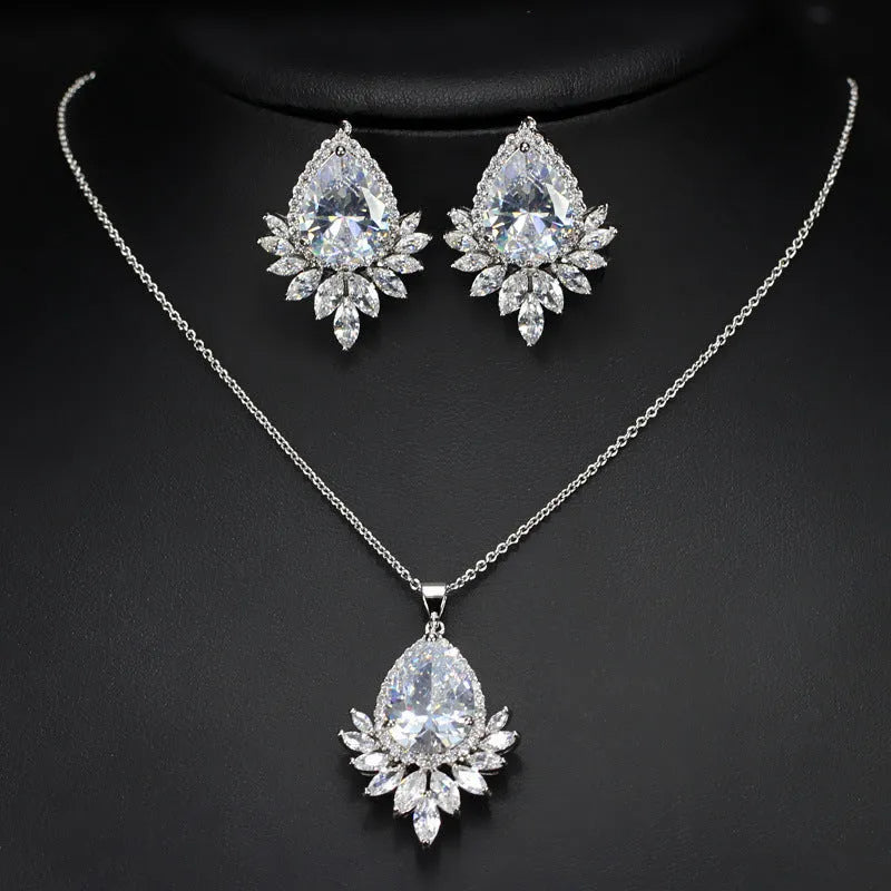 AAA cubic zirconia jewellery set with necklace and earrings in blue, red, or white stones on a nickel-free metal chain.