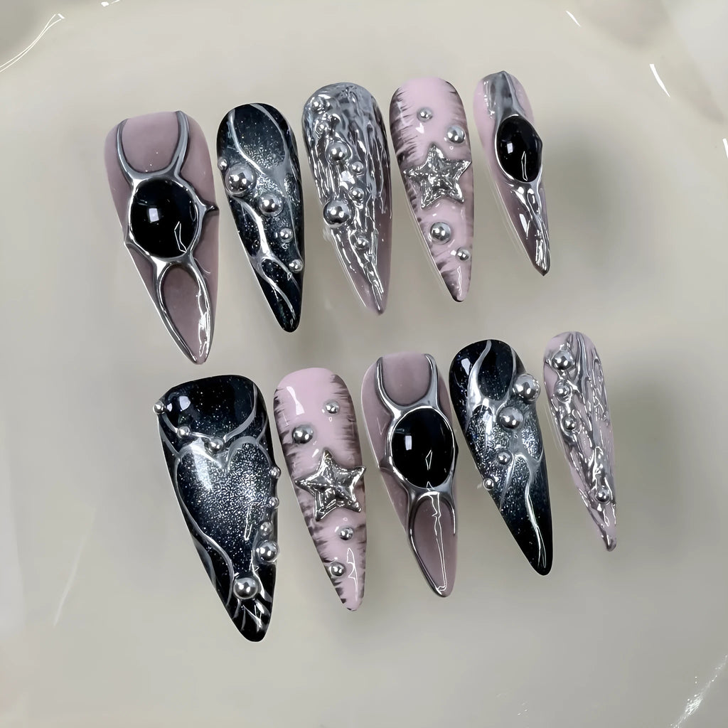 Long pointed press-on false nails with embossed relief and hand-painted metal detail in XS S M L sizes