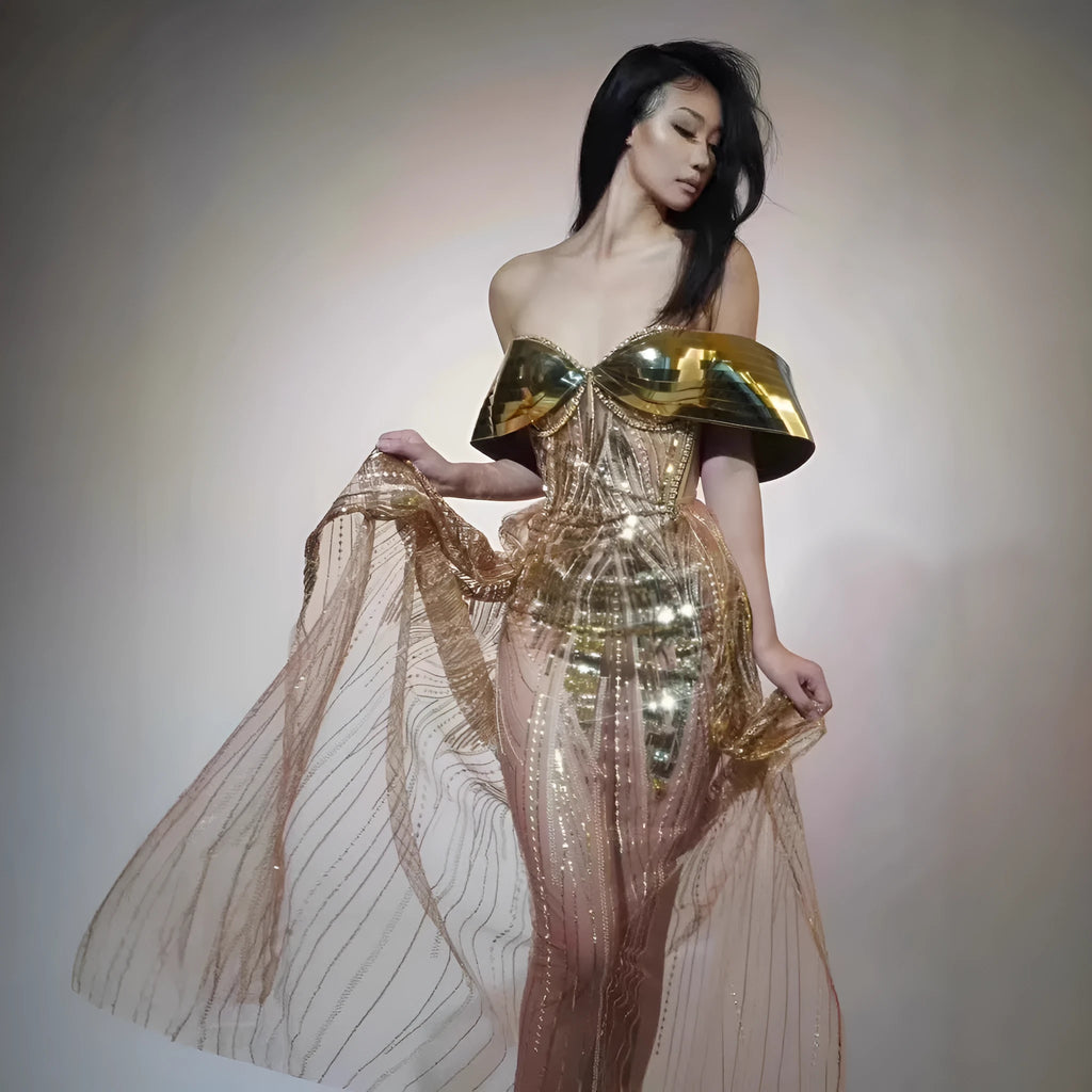 Gold strapless sequined dress with tulle skirt split, showing front and back views