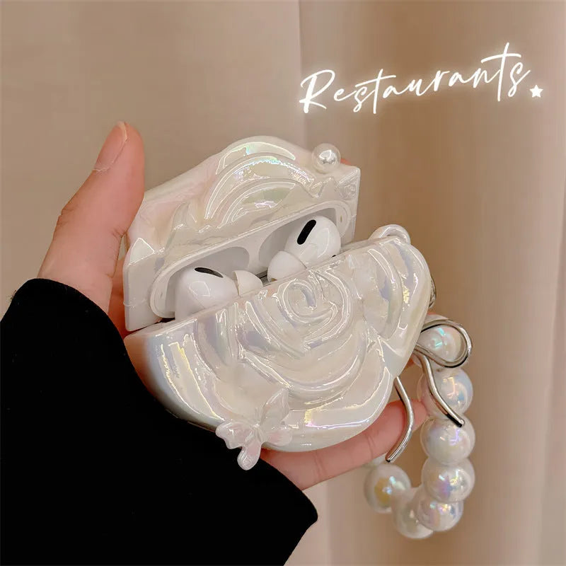 Pearl white camellia silicone AirPods case with lanyard, laser pearlescent finish