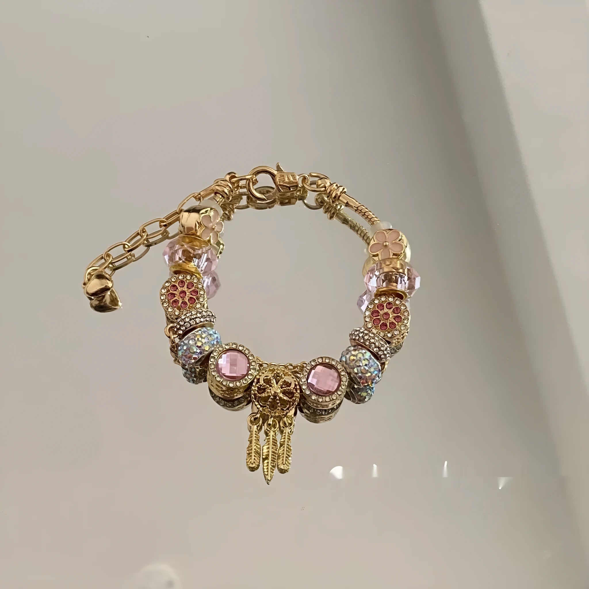 Women's dreamcatcher bracelet with colourful crystals, star shape, electroplated mixed material finish