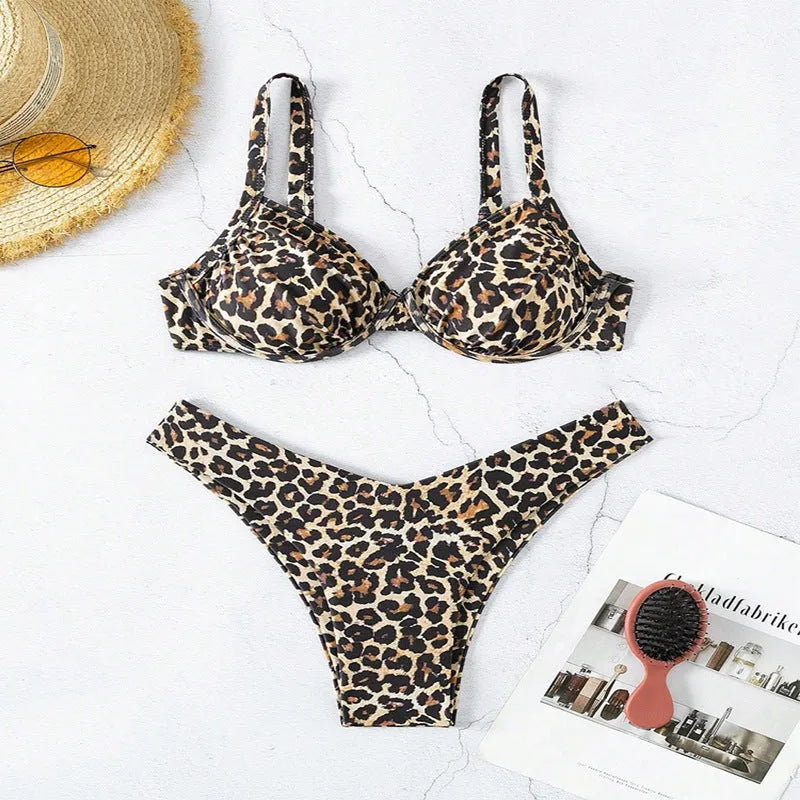 Women's leopard print creative sling high-waist split swimsuit in brief style, front view on model