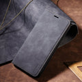 Leather-style TPU protective case for iPhone with card slots and kickstand bracket in black