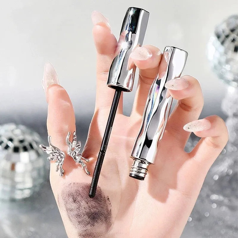 Steel tube waterproof mascara with applicator and optional eyelash curler in black or brown