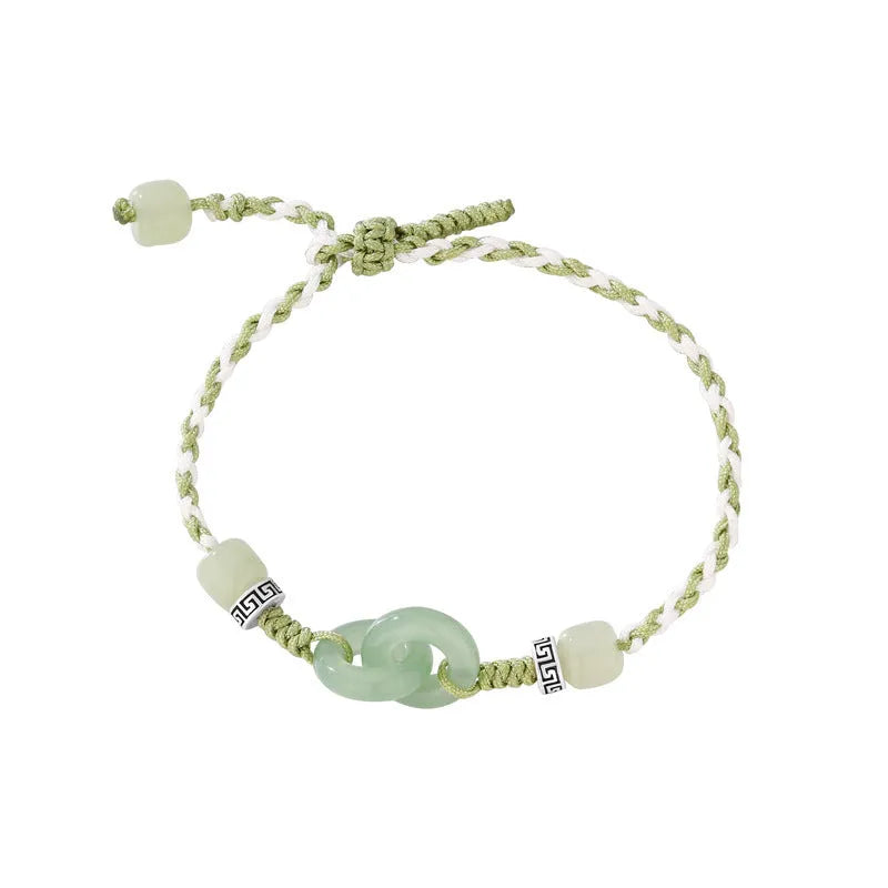 Green jade and copper ethnic bracelet with peace buckle centrepiece and double ring design