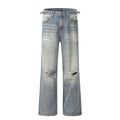 Blue retro straight-leg jeans with ripped details on a mannequin.