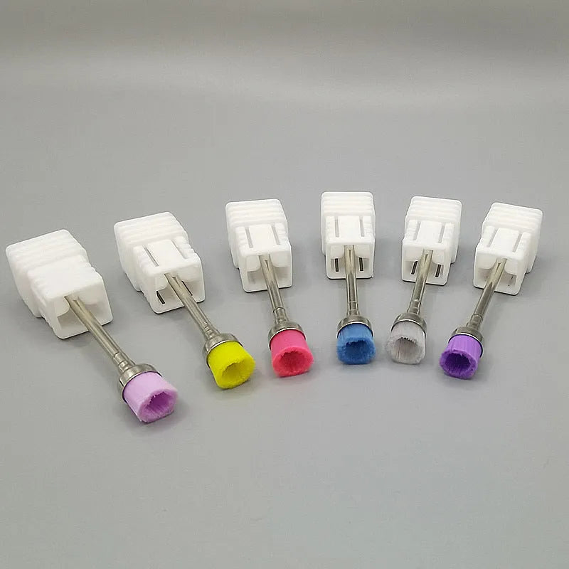 Polishing brush for cleaning nail grinding heads, available in multiple colours, with a simple handheld design.
