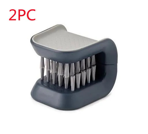Blue U-shaped plastic brush for cleaning knives and forks in kitchen sink
