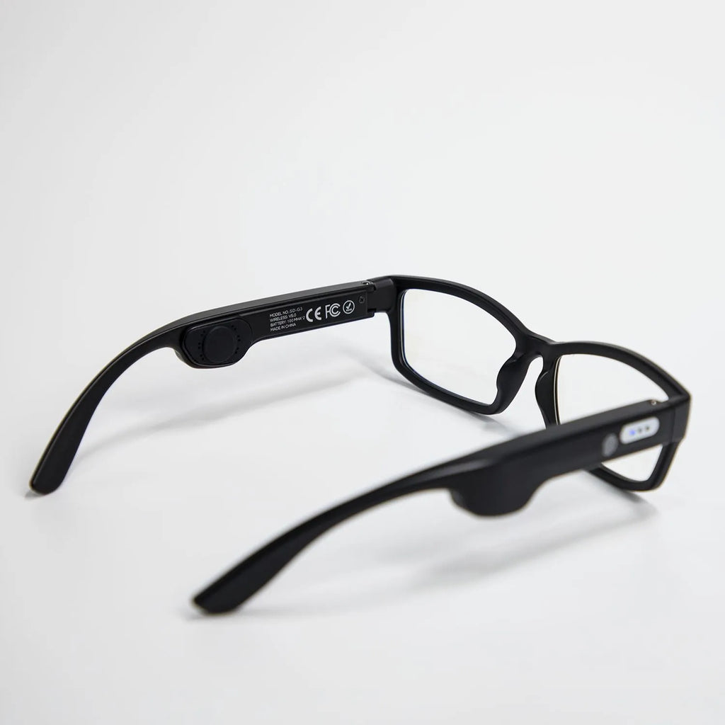 Smart Bluetooth sunglasses with red frame and black lens, touch control, and stereo loudspeaker for outdoor use