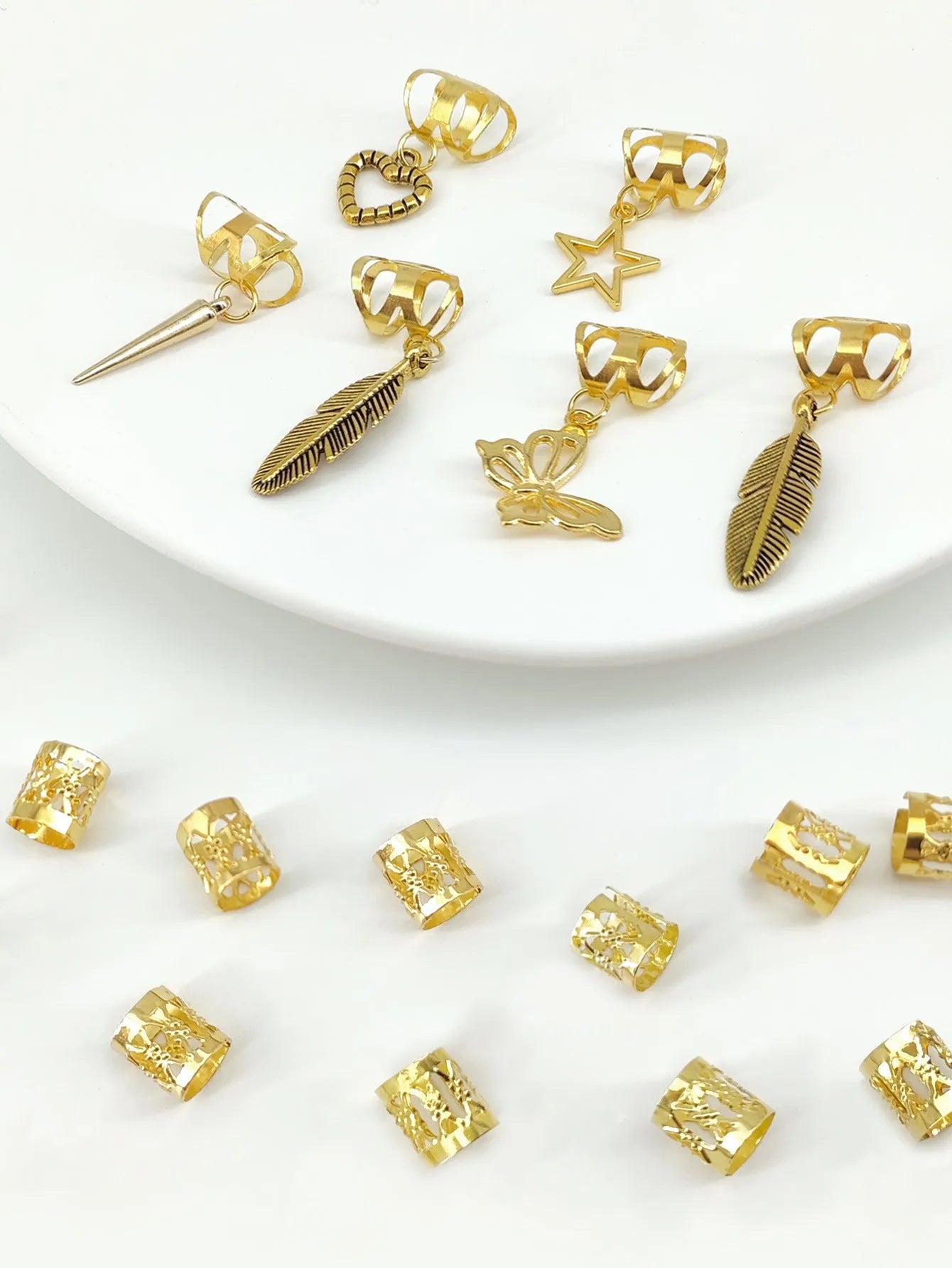 Pack of 26 antique-style trendy leaves dirty braid hair rings in gold or silver alloy.