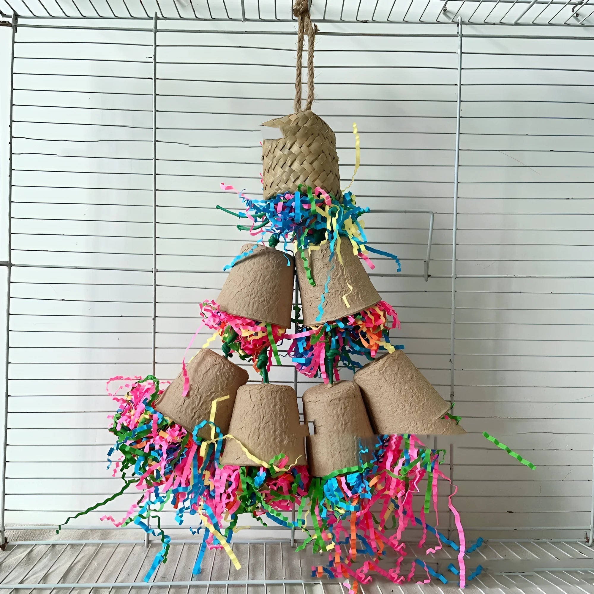 Palm leaf woven parrot gnawing toy with paper cup shape hanging from cage