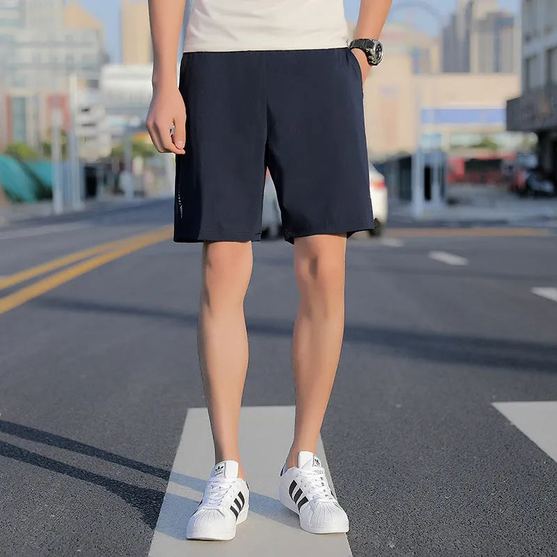 Men's cotton sports shorts in grey, black, or blue, five-point style, sizes L to 10XL, quick-drying.