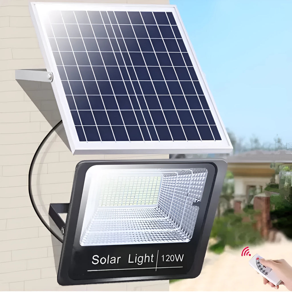 Black solar-powered LED flood light with solar panel on top, mounted on an outdoor wall.