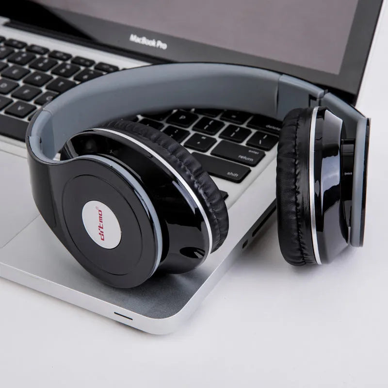 Wired gaming headphone over-ear style heavy bass with inline control microphone on white background