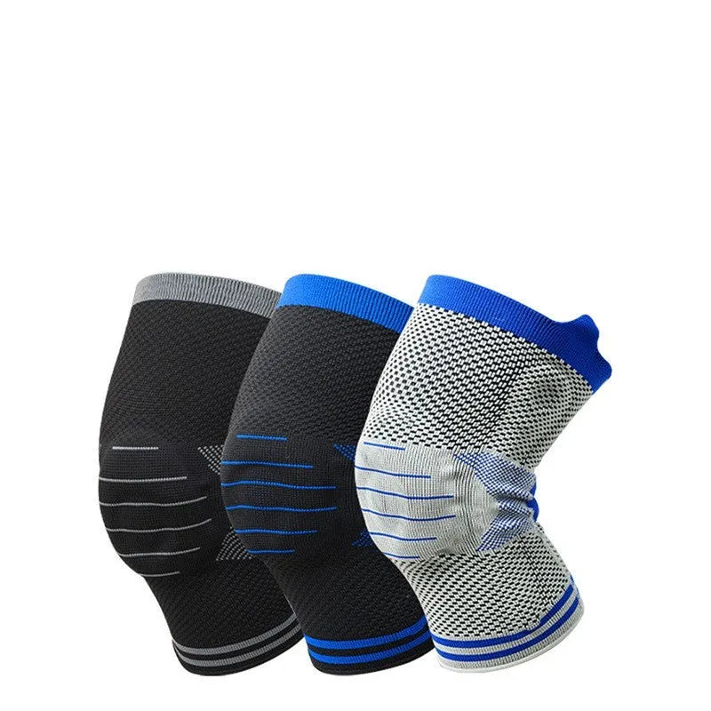 A single black and grey cotton knee pad featuring a central silicone shock absorber bar.
