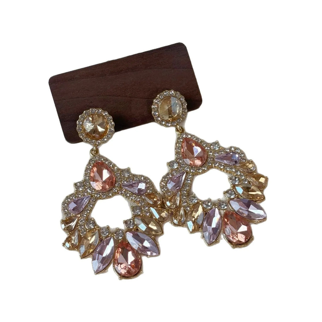 Pair of geometric rhinestone earrings with dot pattern on alloy base for women