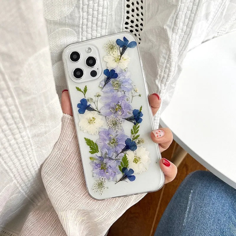 Blue and purple dried flowers design on a soft TPU case for iPhone
