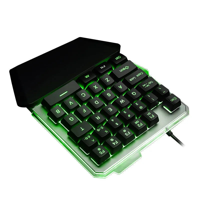 Black G40 Flow one-handed robotic keyboard with RGB backlit keys on a desk.