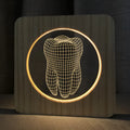 Tooth shaped night lamp with wood acrylic finish, shown with USB cable.