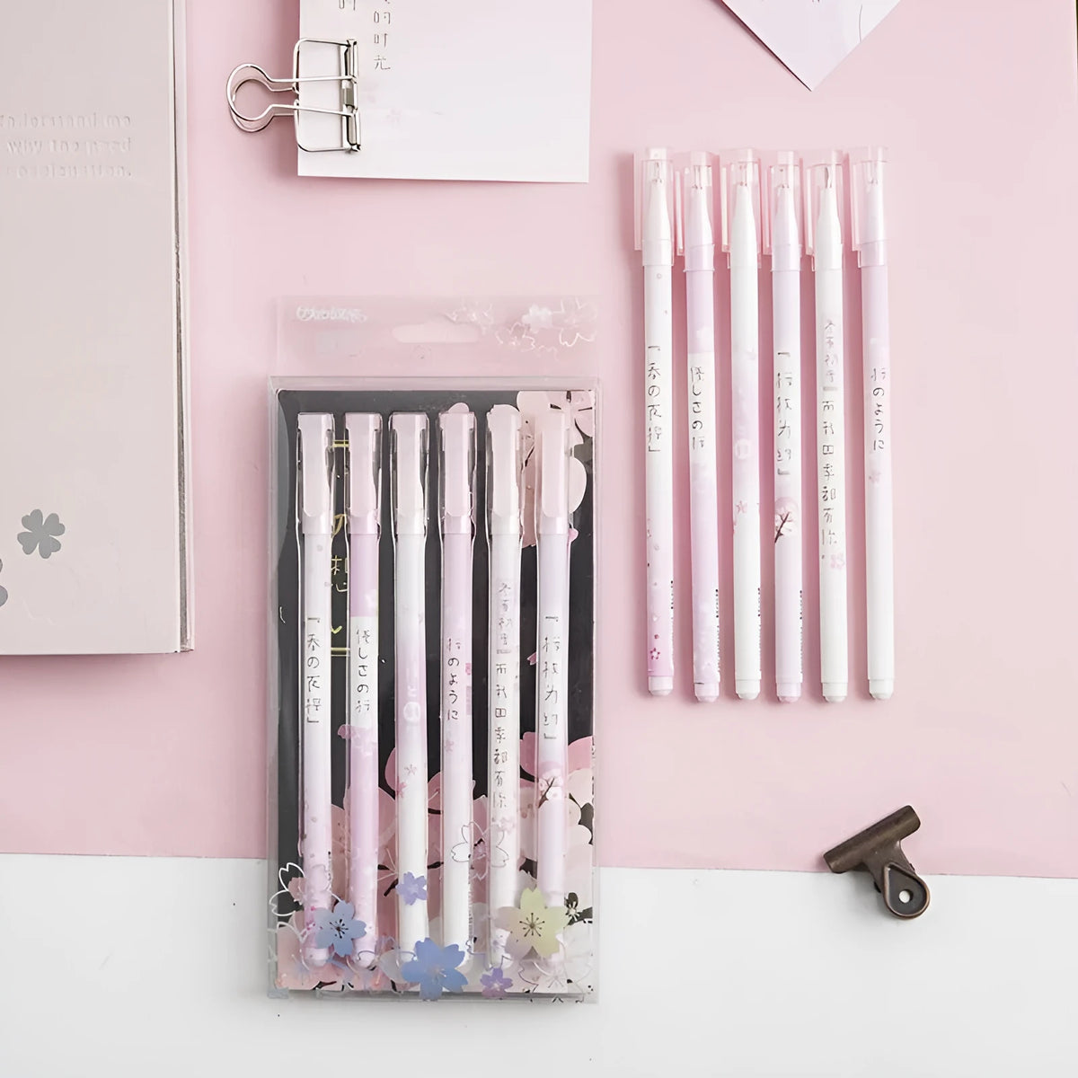 Creative Sakura gel pen set of six black pens with 0.5mm needle tube refill on white background