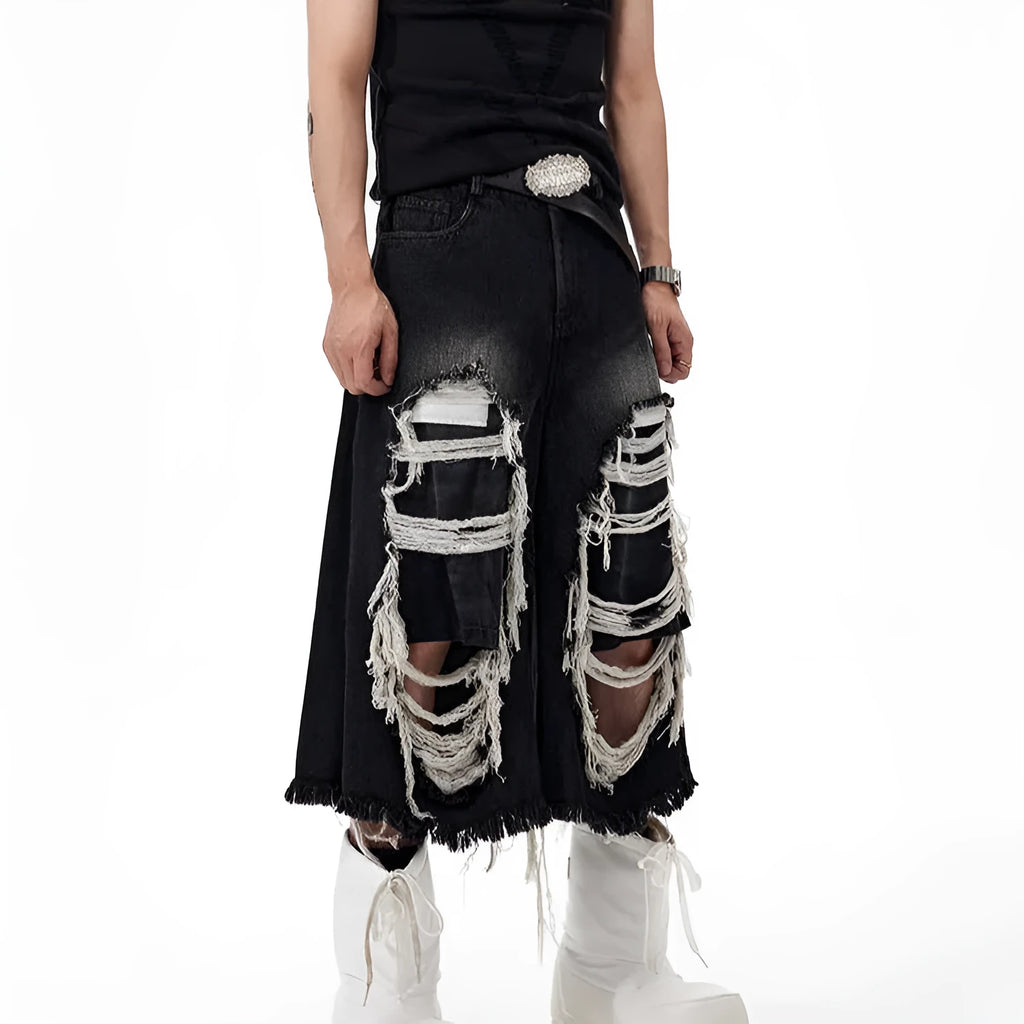 Black cropped wide-leg jeans with ripped patch details and mid-high waist