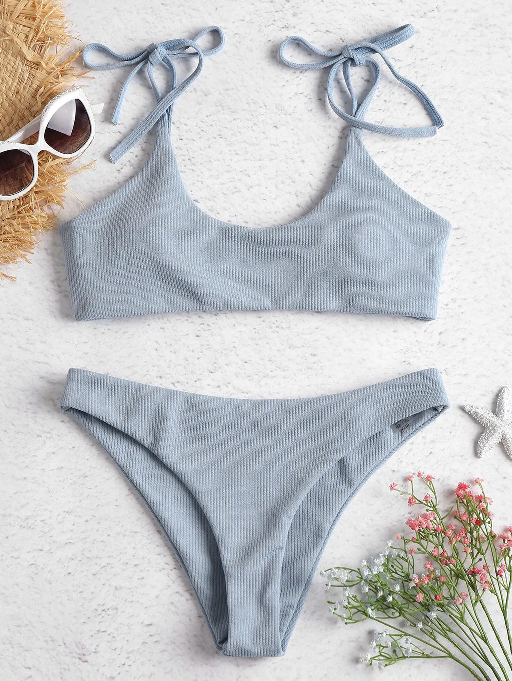 Women's strapless low waist bikini set in blue made from chlorinated fibre and nylon blend, front view