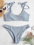 Women's strapless low waist bikini set in blue made from chlorinated fibre and nylon blend, front view