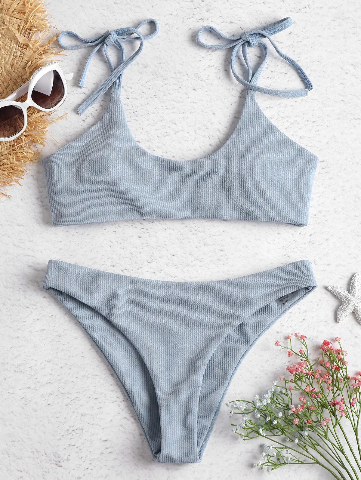 Women's strapless low waist bikini set in blue made from chlorinated fibre and nylon blend, front view