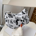 Women's small nylon underarm bag with leopard print pattern and zipper closure, 23cm size
