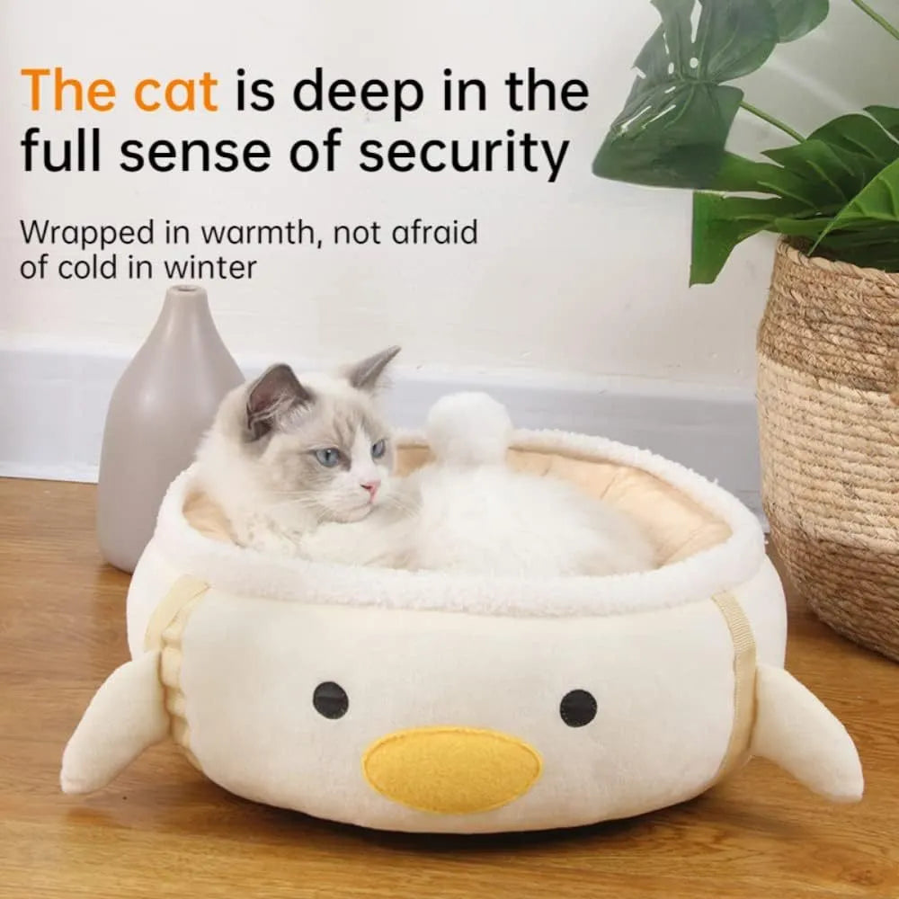 Green chick-shaped cat bed that can be used flat or hung as a hammock for a small cat.