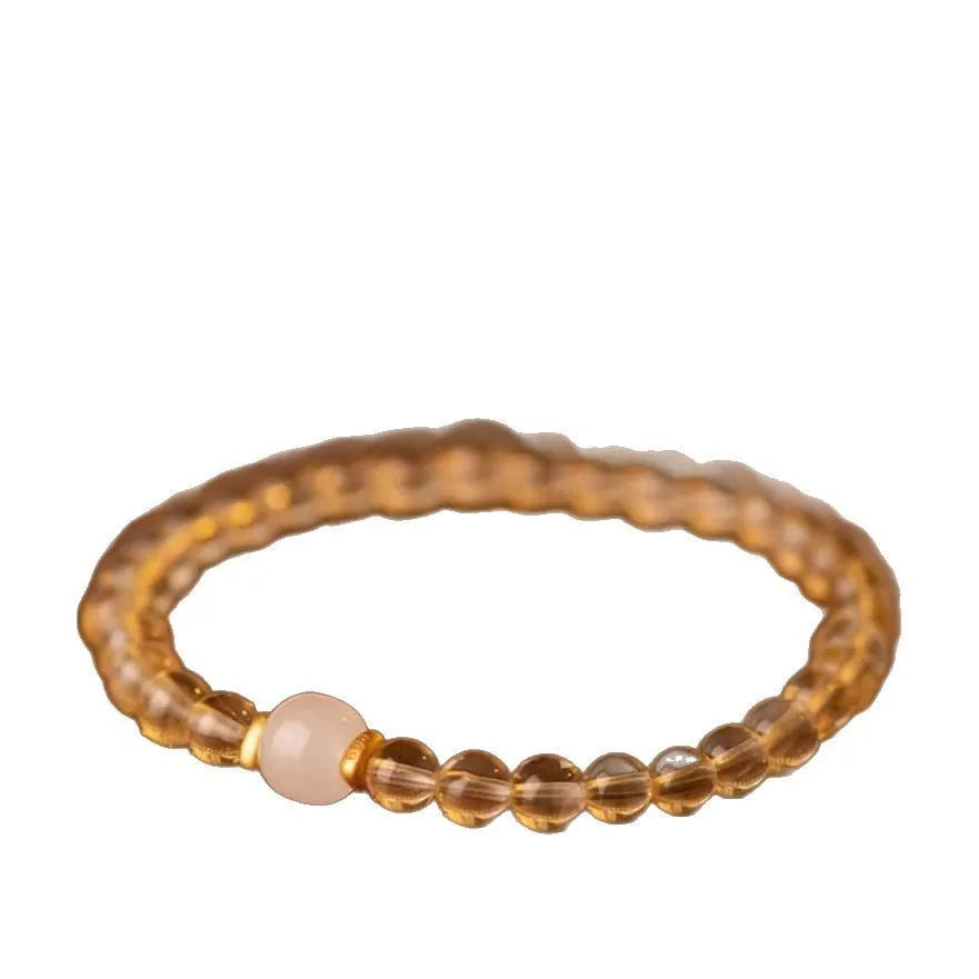 Handmade natural gold rutilated quartz bracelet from Brazil with Putuo stone and pearl accents